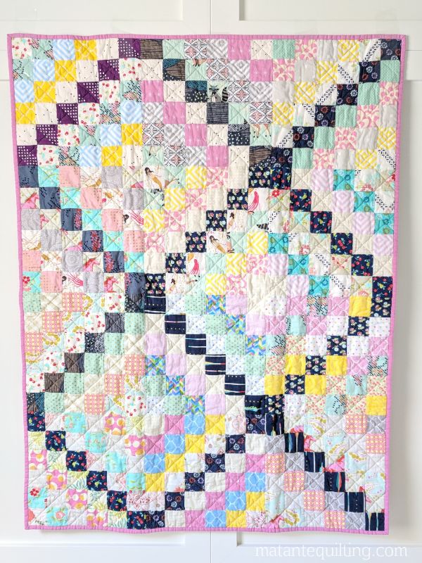 https://matantequilting.com/wp-content/uploads/2018/08/Scrappy-Trip-Around-the-World-Quilt-Full-Wall-Wide.jpg