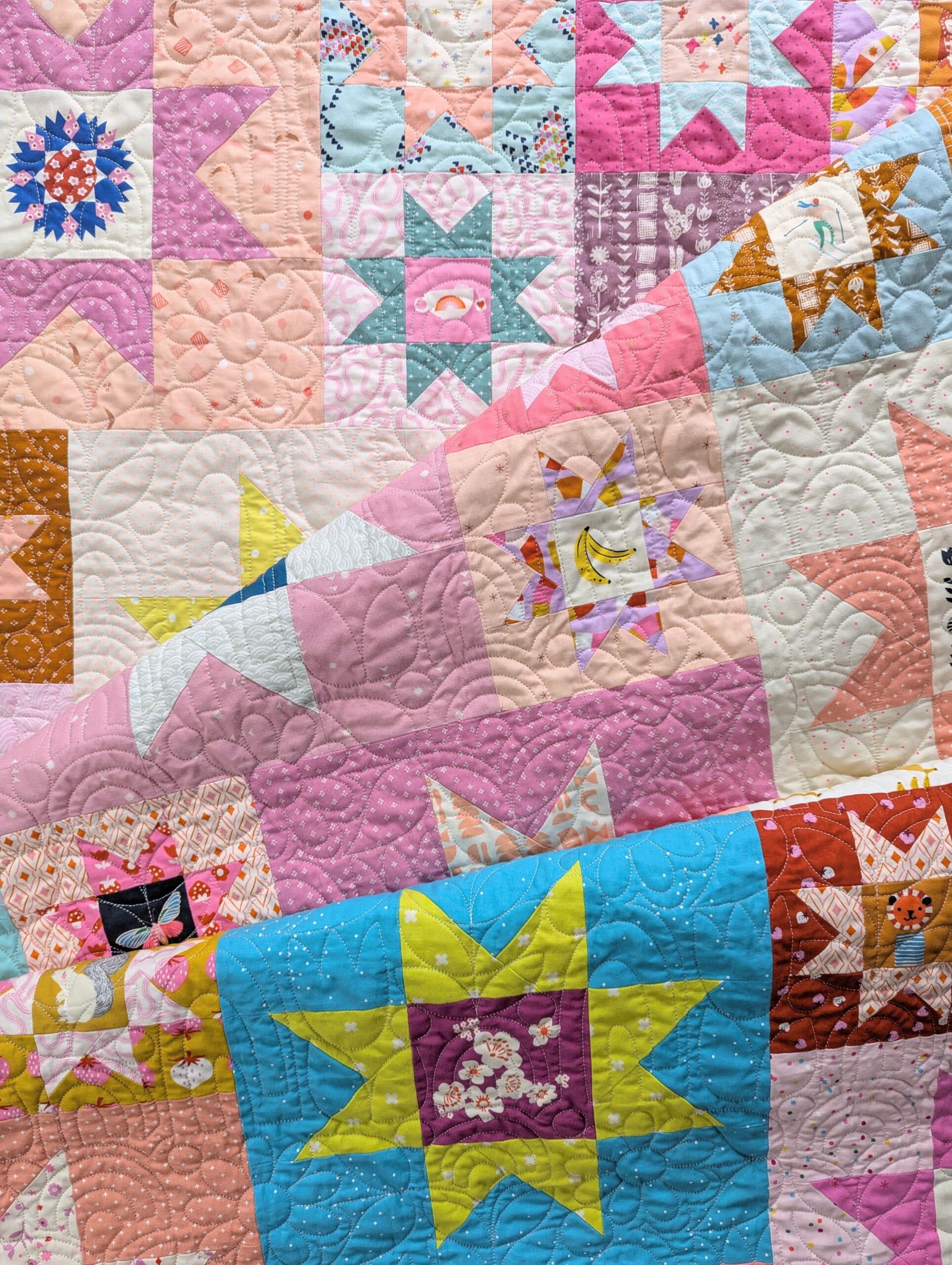 Quilt laying on floor.