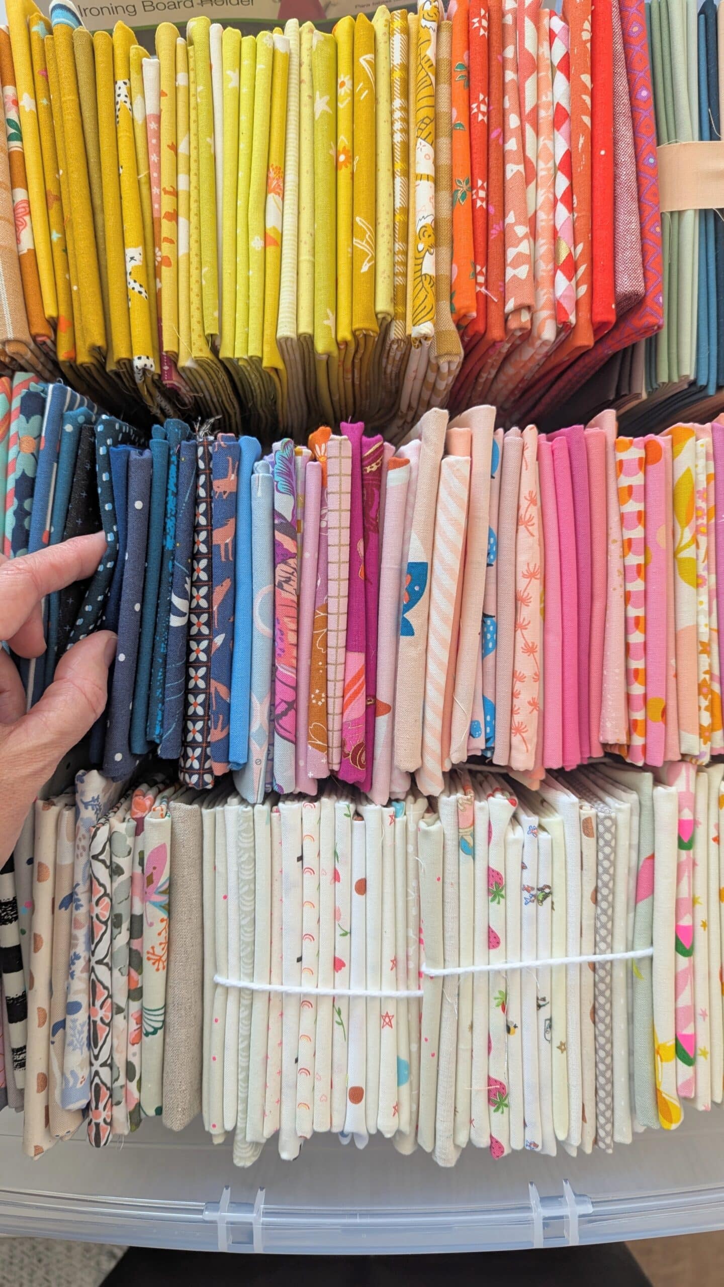 Overhead view of a bin filled with fabric.